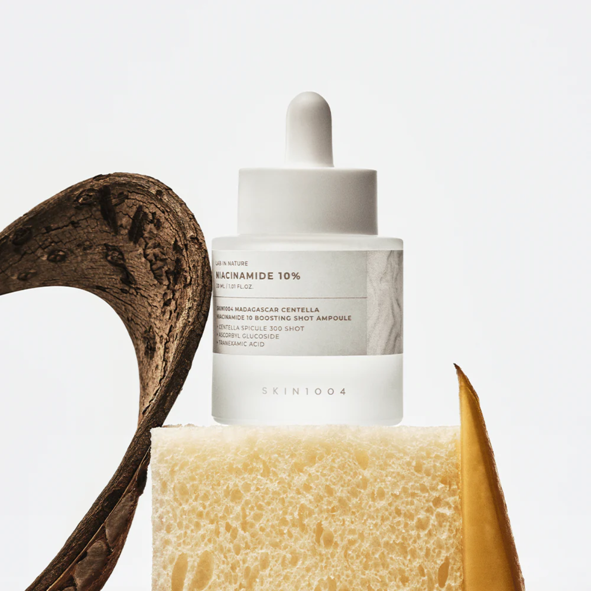 Centella asiática y niacinamida serum Serum iluminador antimanchas SKIN1004